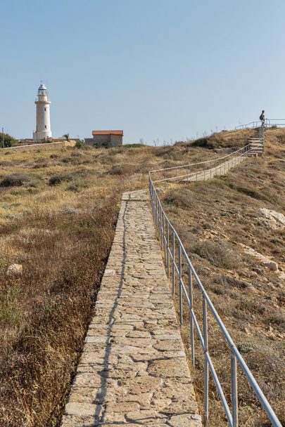 Paphos landscape with old lighthouse and woman on Cyprus - Fotografie, Obrázek