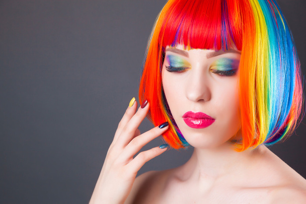 beautiful woman wearing colorful wig - Foto, immagini