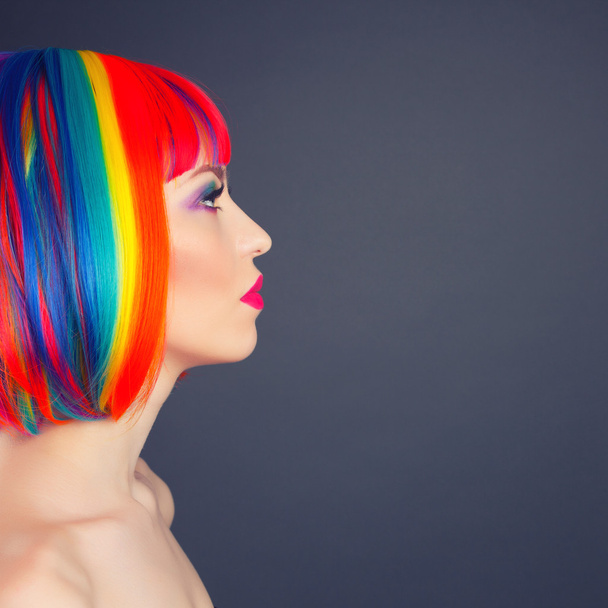 beautiful woman wearing colorful wig - Valokuva, kuva