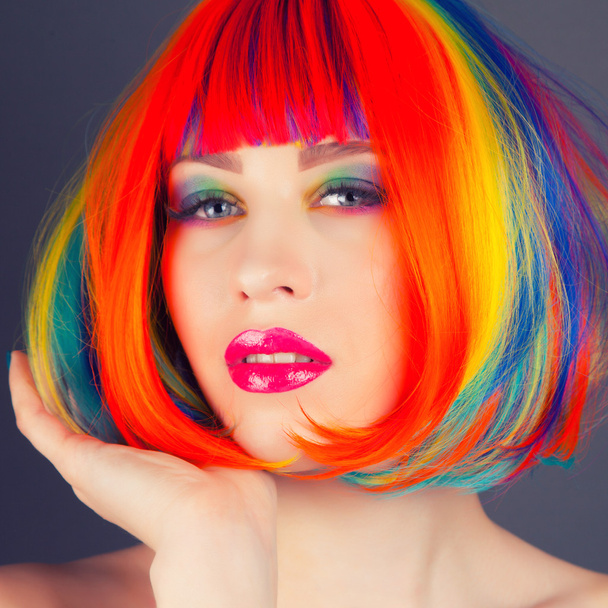 beautiful woman wearing colorful wig - Photo, image