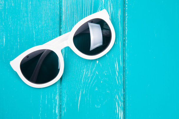 Stylish white sunglasses - Foto, Imagen