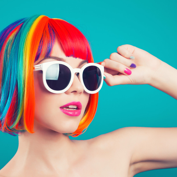 beautiful woman wearing colorful wig - Zdjęcie, obraz