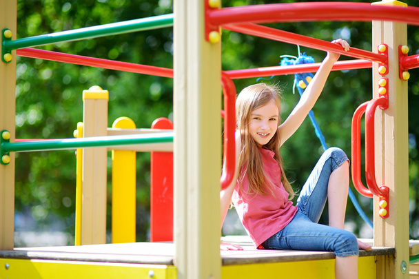 Little girl having fun on a playground - Foto, Imagem