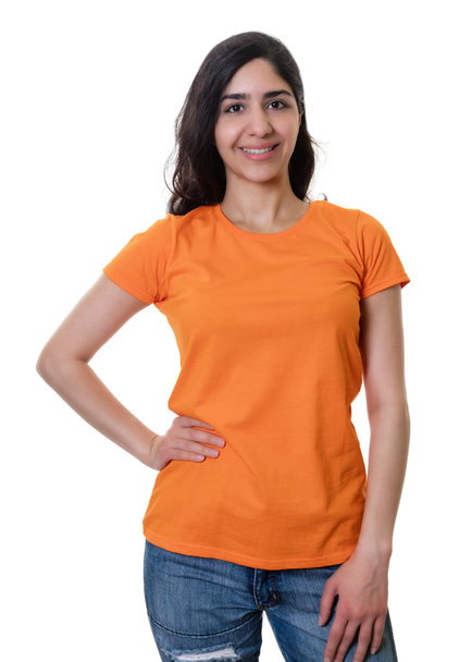 Standing arab woman with orange shirt - Zdjęcie, obraz