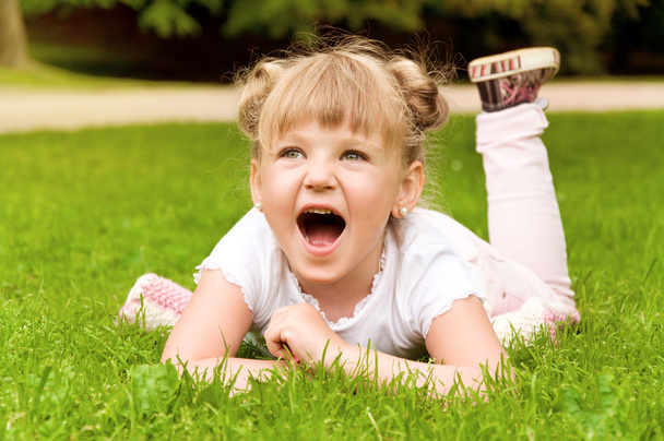 little girl having fun in the park - Photo, Image
