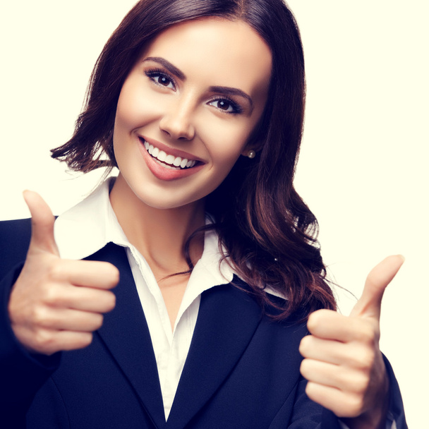 businesswoman showing thumbs up gesture - Photo, image