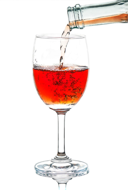 Red wine poured in a glass  - Photo, image