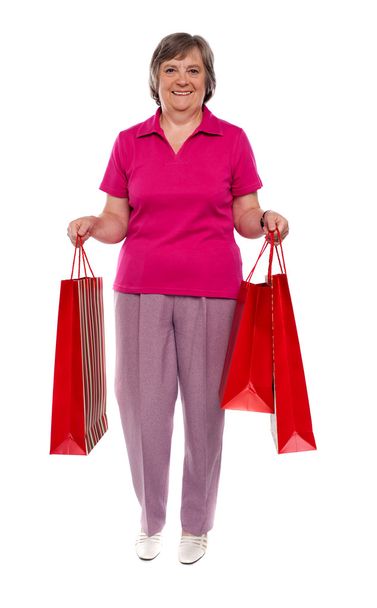 Woman holding shopping bags - Foto, imagen