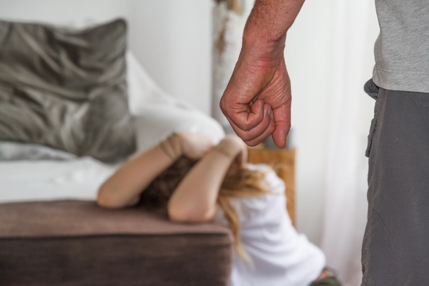 Domestic violence at home - Фото, изображение