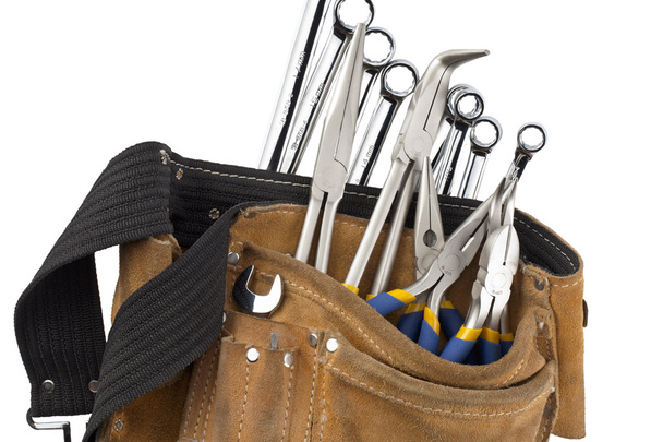 Cinturón de herramientas con llaves y alicates
 - Foto, Imagen