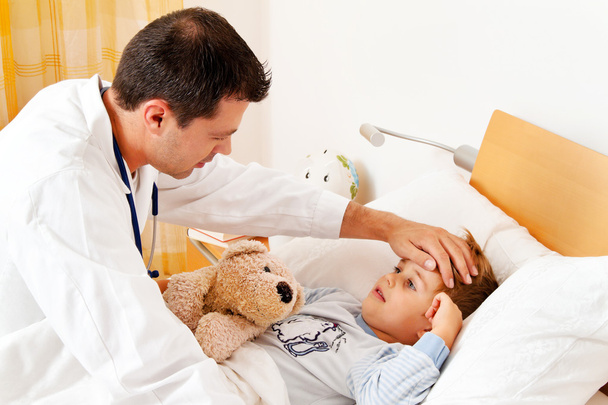 Doctor house call. examines sick child. - Photo, Image