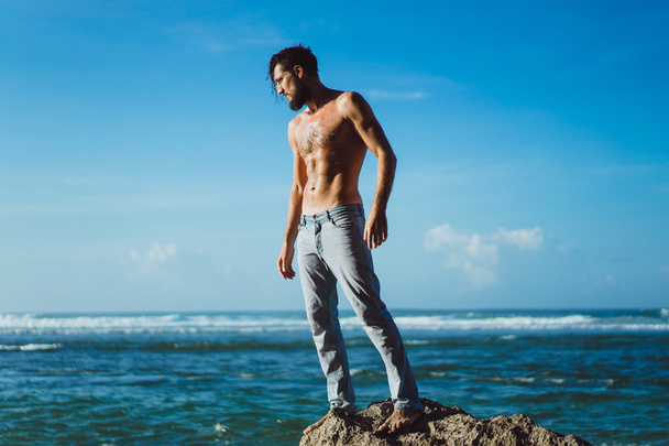 man on the beach on  ocean background - Фото, изображение