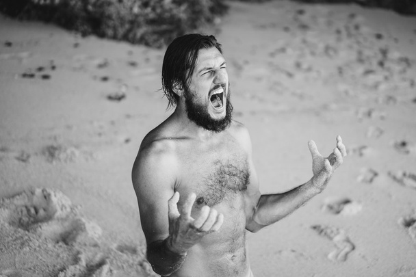  man with beard fave fun on beach - Foto, Bild