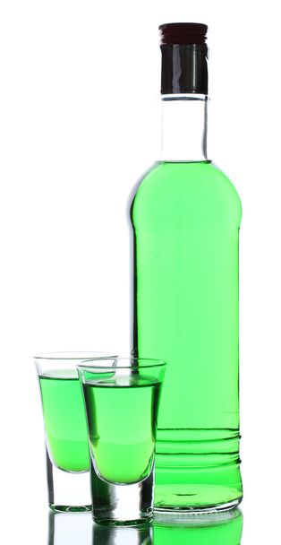 Bottle and two glasses of absinthe isolated on white - Foto, Imagen