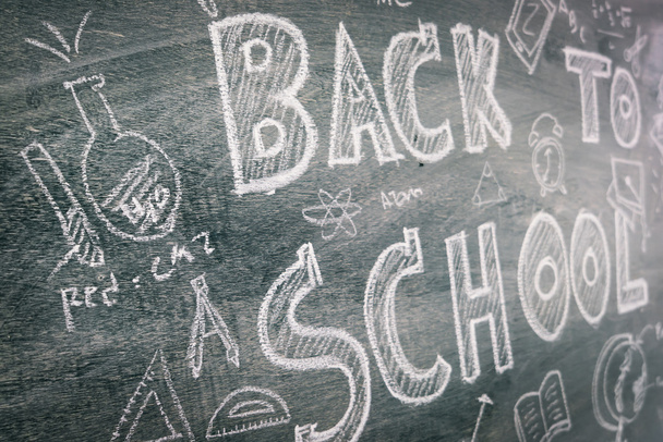 Freehand drawing Back to school on chalkboard - Foto, Imagen