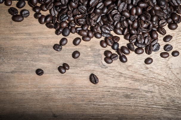 Kaffeebohnen auf Holz Tisch Hintergrund - Foto, Bild