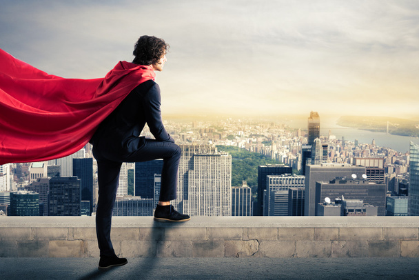 Zakenman met een superheld cape  - Foto, afbeelding