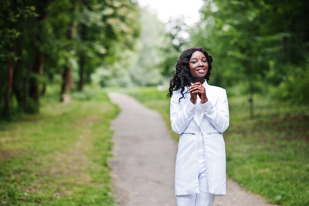 Portrait of stylish black african american girl stay on path on  - Фото, изображение