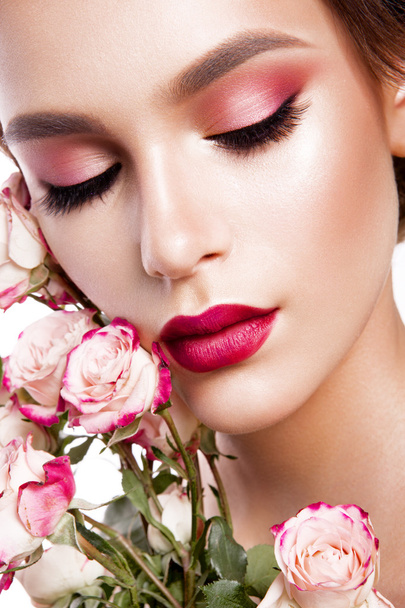 Portrait of young beautiful woman with stylish make-up - 写真・画像