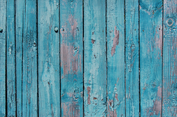 Kék fa deszka repedt festékkel - Fotó, kép