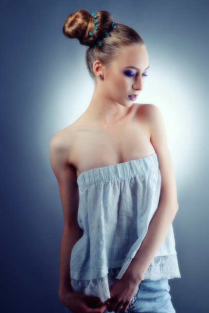 Young beautiful blond woman with styled hair - Valokuva, kuva