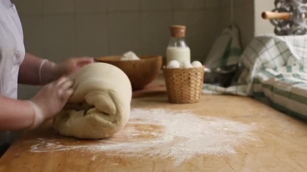 The dough is kneaded his hands - Footage, Video