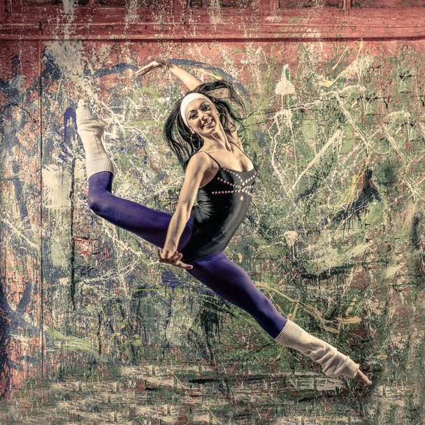 Portrait of fit young woman jumping - Фото, изображение