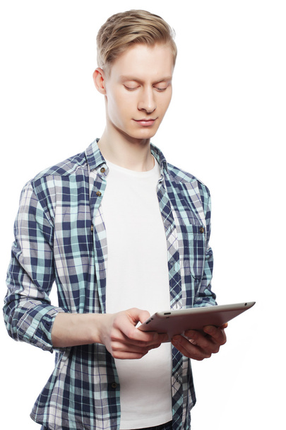 Happy Young Man Using Digital Tablet Isolated - Foto, imagen