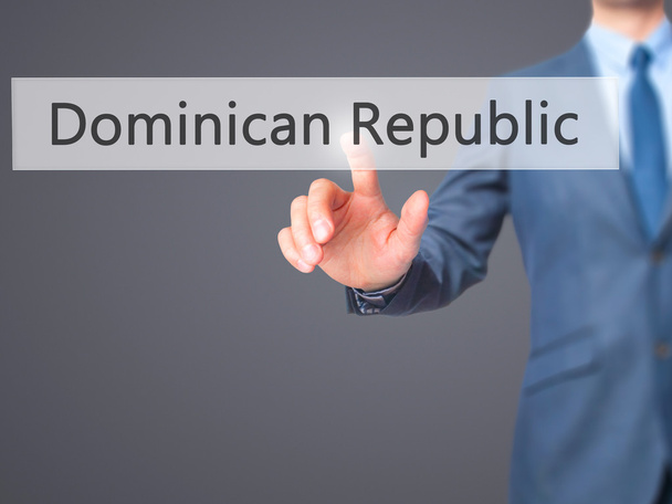 ドミニカ共和国 - タッチsのビジネスマンの手押しボタン - 写真・画像