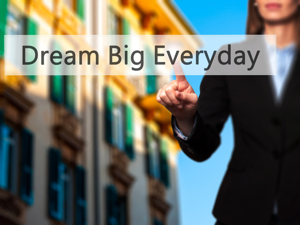 Dream Big Everyday - Businesswoman hand pressing button on touch - Photo, Image