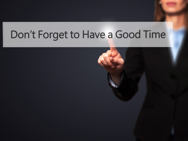 Don't Forget to Have a Good Time - Businesswoman hand pressing b - Photo, Image