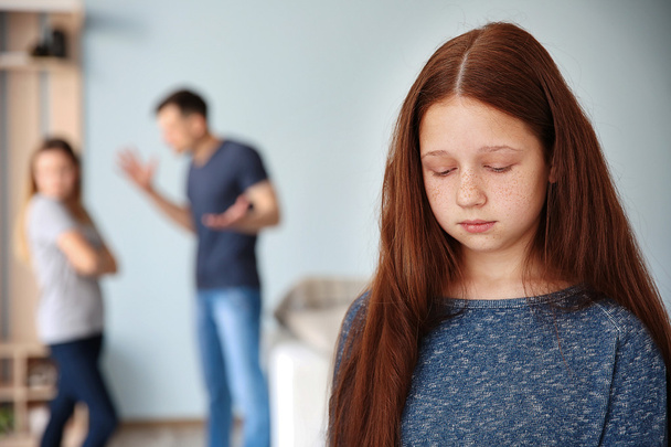 Family problems concept. Sad girl and abusing parents - Zdjęcie, obraz