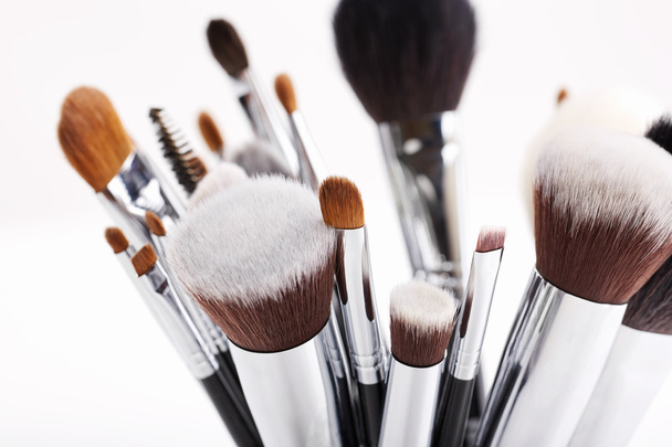 Set of various makeup brushes on white background. - Photo, Image