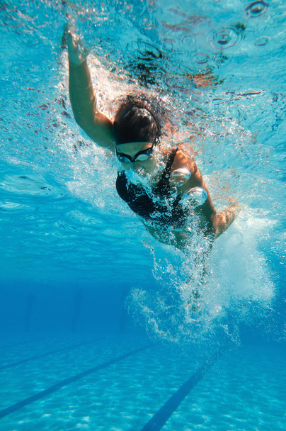 athlete swimming in swimming pool - Valokuva, kuva