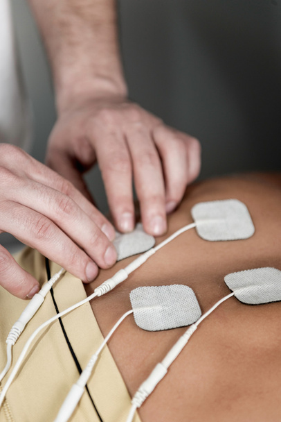 TENS treatment in physical therapy - Photo, Image