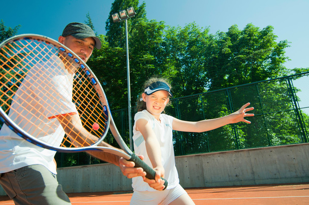 entrenador con jugador de tenis junior
 - Foto, imagen