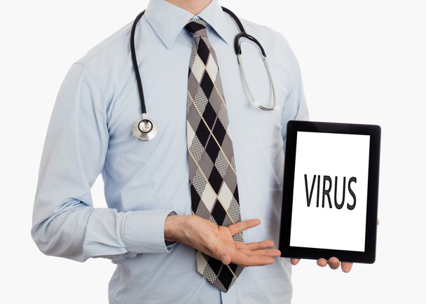 Tableta de retención del médico - Virus
 - Foto, imagen