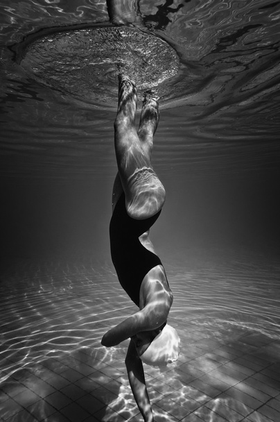 Synchronized swimmer underwater - Photo, Image