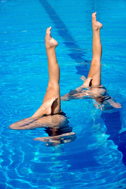 swimmers performance with legs outside water - Photo, Image