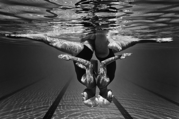 synchronized swimming duet performing dance - Photo, Image