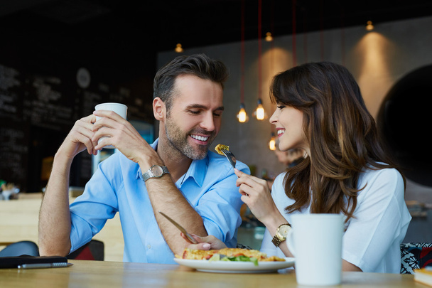 couple in  restaurant eating lunch - Photo, image