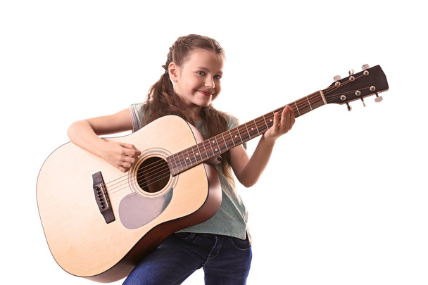 Little girl playing guitar - Фото, изображение