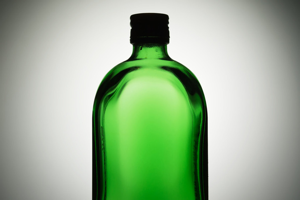 Botella de vidrio verde
 - Foto, Imagen