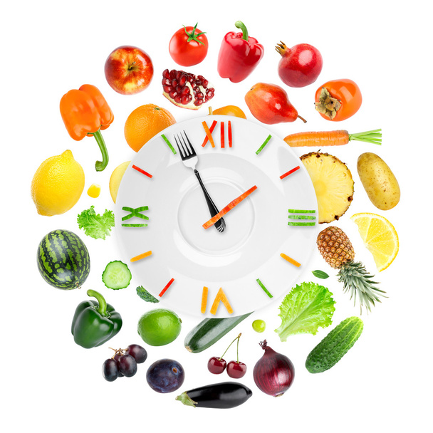 Food clock with fruits and vegetables - Foto, Bild