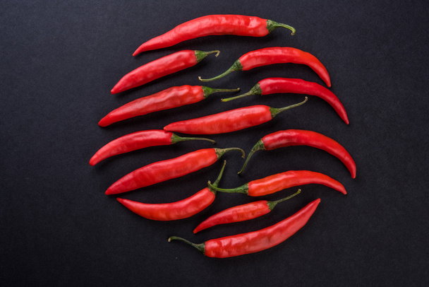 farm fresh chilli, red chilli, black background, group,random, selective focus - Fotografie, Obrázek
