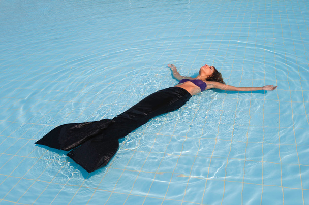 Black mermaid in pool - Fotó, kép