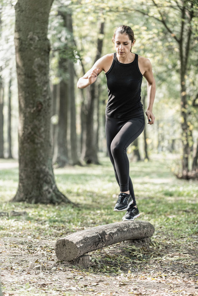 Female athlete on fitness trail - Photo, Image