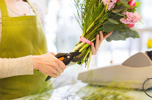 florist woman with flowers and pruner - Foto, Imagem