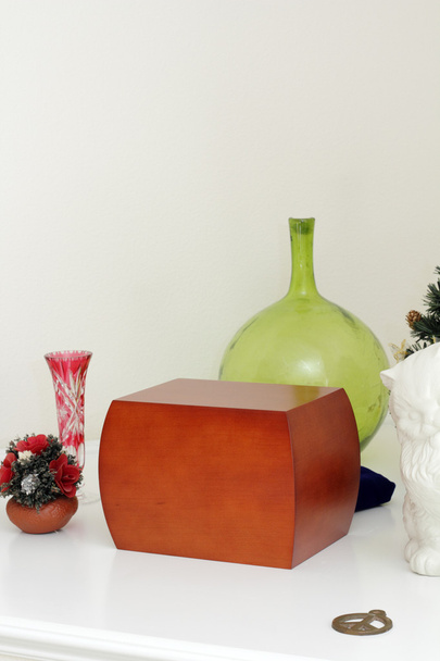 Urn on a Mantle with Memories - Photo, Image