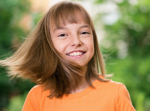 Portrait of smiling girl - Фото, изображение